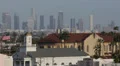 Los Angeles LA Downtown Skyline Hollywood Buildings Roofs American Flag Aerial HD Footage