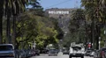Los Angeles Neighborhood Hollywood Sign Rich People Houses Cars Passing Sunny HD Footage