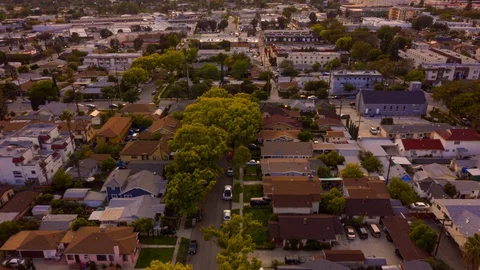 Los Angeles, Pullback from Mountain with Sunset Aerial Motion Timelapse Stock Footage 128464075