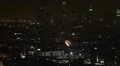 Los Angeles Skyline, Hollywood by night Highway, aerial view, crowd travel car HD Footage