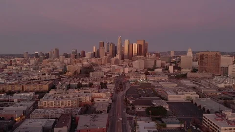 Los Angeles sunrise dawn downtown buildings skyline aerial moving flying drone Stock Footage