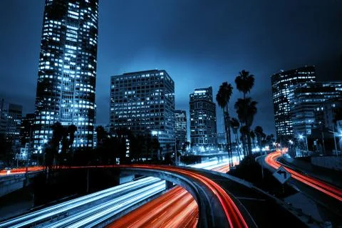 Los angeles, urban city at sunset with freeway trafic Stock Photos