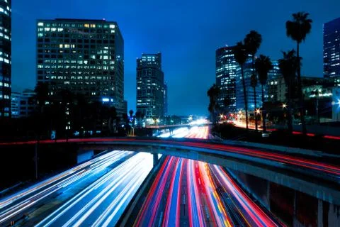 Los angeles, urban city at sunset with freeway trafic Stock Photos