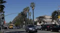 Los Angeles, USA, Car Traffic, Hollywood High School on Sunset Strip Boulevard HD Footage
