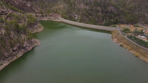 Los perez dam reflecting green water in gran canaria, canary islands Stock Footage 313225536