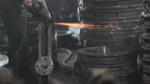 Lose-up blacksmith welder in protective mask works with metal steel and Stock Footage 171404404