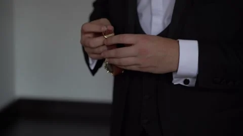 Lose-up, Hands of wedding groom getting ready in suit 4k Stock Footage 169726945
