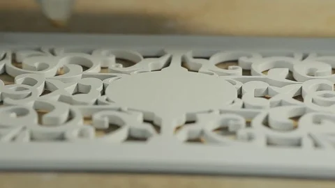 Lose-up, a machine for laser engraving of a drawing on a wooden workpiece. Stock-Footage 82098724