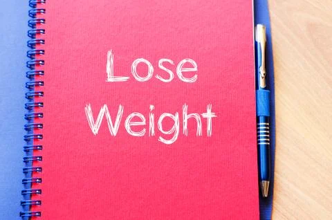 Lose weight write on notebook Stock Photos