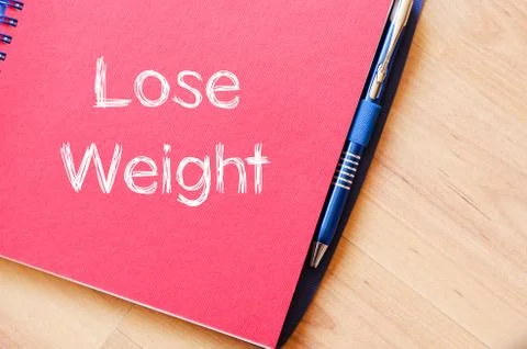 Lose weight write on notebook Stock Photos
