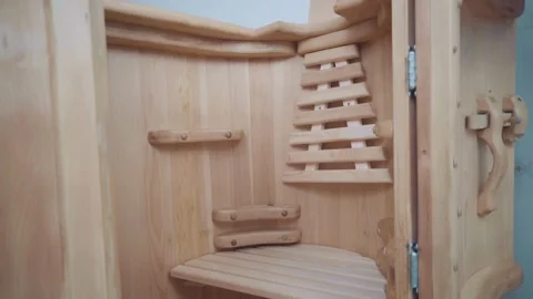 Loseup cedar phytobarrel. Inside, grates on floor,back and seat, and handstands Stock Footage 154002723