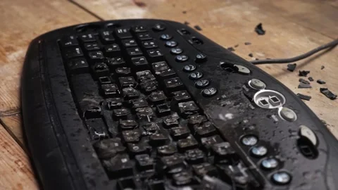 The losing computer player breaks the keyboard. Depression at work. Stock-Footage 136850026