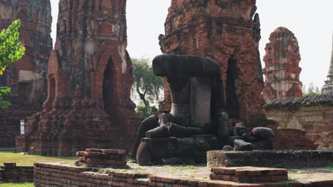 Losing head buddha statue in Ayutthaya temple, Thailand. Video stock 306773848