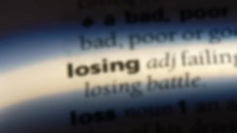 Losing word in a dictionary. Stock Footage 99562921