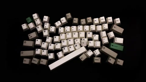 Losse computer keyboard keys moving around Stock Footage 164472433