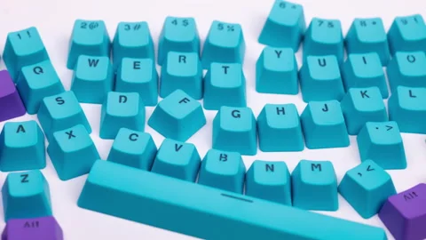 Losse computer keyboard keys moving around Stock Footage 164718051
