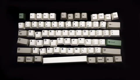 Losse computer keyboard keys moving around Stock Photos