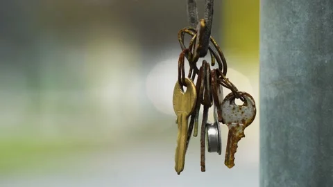 Lost and found a rusty key on the street. Stock Footage 148440577