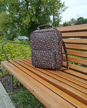 Lost backpack on the bench Stock Photos