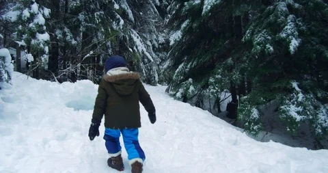 Lost Boy walking on the snow. Stock Footage 100656186