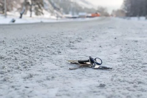 Lost a bunch of keys lying on the side of the road Stock Photos