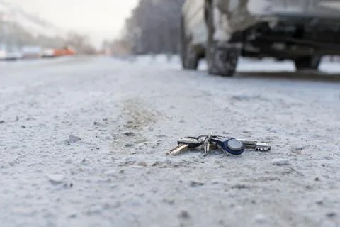 Lost a bunch of keys lying on the side of the road Stock Photos