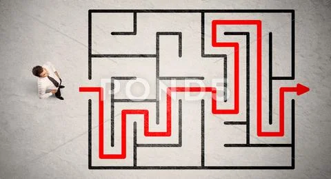Lost businessman found the way in maze with red arrow Stock Photos