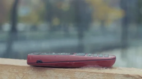 Lost cell phone in snow Stock Footage 69039981