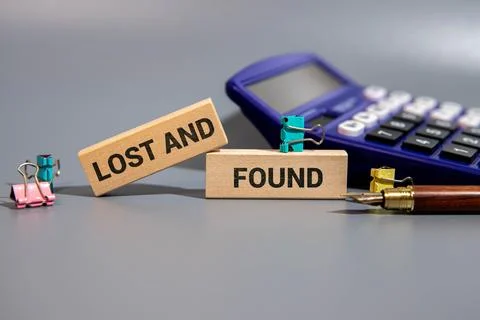 Lost found text on an open notepad against the background of money Stock Photos