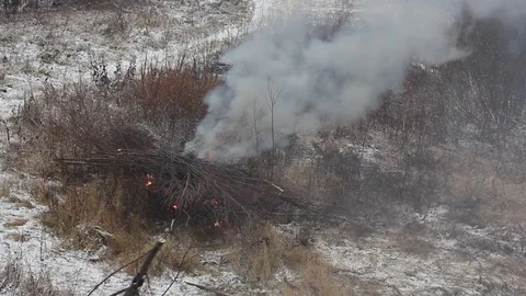 Lost hikers kindles a rescue fire using gasoline. Stock Footage 82024809