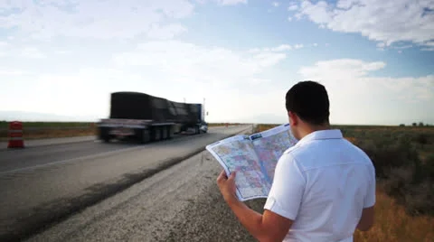 Lost man looking in map Stock-Footage 26591430