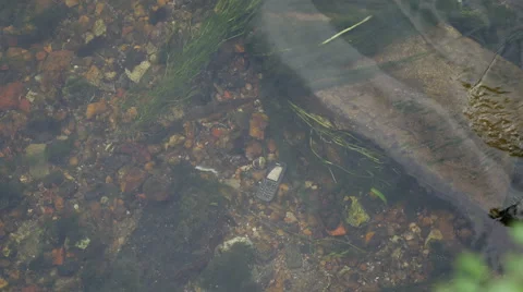 Lost Mobile phone in Flowing River Stock Footage 41930291
