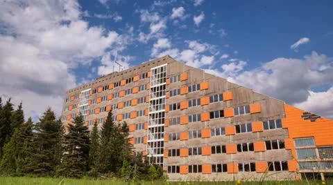 Lost NVA Hotel with Clouds Timelapse 4K Stock Footage 11129792