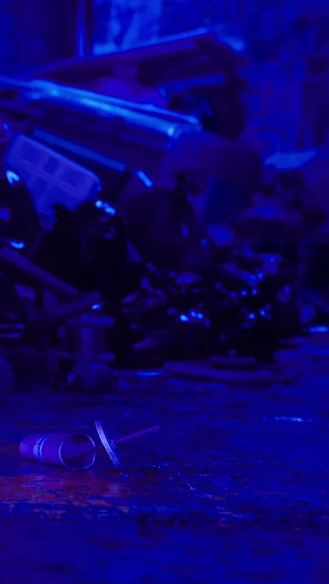 Lost object rests on ground surrounded by clutter at night Stock Footage 331761738