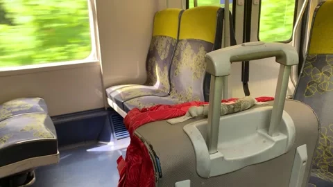 Lost Suitcase in an empty train from Paris Suburb Public transport, August Stock Footage 158977439