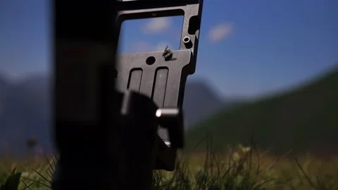 Lost three-axis stabilizer along which a fly crawls lies in a mountain meadow Stock Footage 158738329