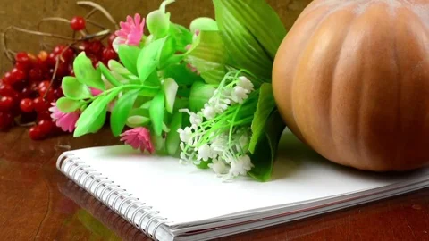 Lot of artificial flowers. Close up. Peonies, Chrysanthemums. Fresh Pumpkin Stock-Footage 70679287