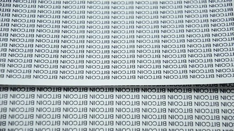 A lot of bitcoins. The concept of producing a large number of bitcoins Vídeo Stock 84865921