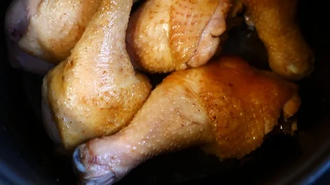A lot of chicken legs boiling Stock Footage 88712449