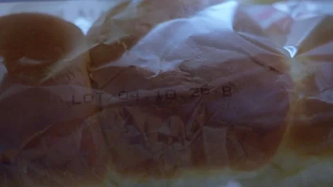 Lot Code Printed on Packaged Bread for Food Traceability Video stock 346993671