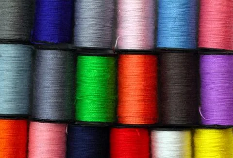 Lot of colored thread spools Stock Photos
