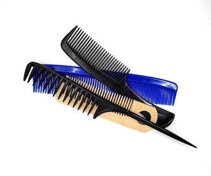 Lot of combs on a white background. Stock Photos