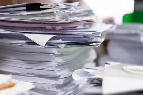 A lot of documents in the office, boring work days Stock Photos