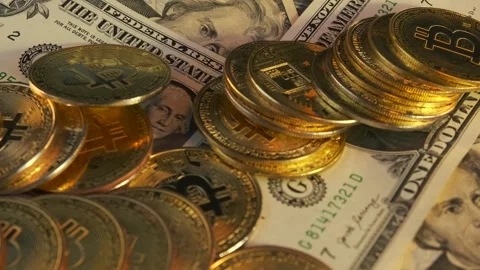 A lot of dollars banknote background, bitcoin stack slowly rotating Stock Footage 266988201