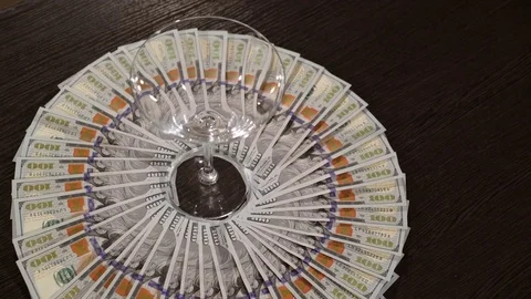A lot of dollars on the black background. 4K Vídeo Stock 70158000