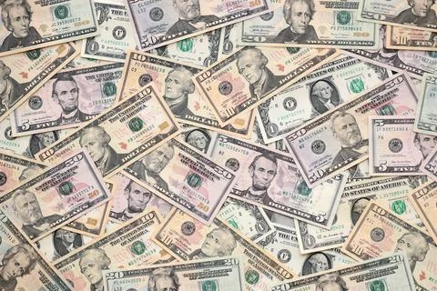 Lot of dollars close up. Stack of dollars and cash with a money background Stock Photos