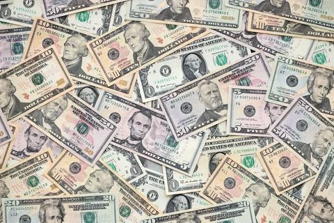 Lot of dollars close up. Stack of dollars and cash with a money background Stock Photos