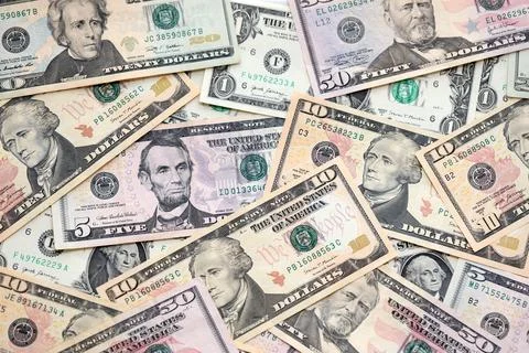 Lot of dollars close up. Stack of dollars and cash with a money background Foto stock