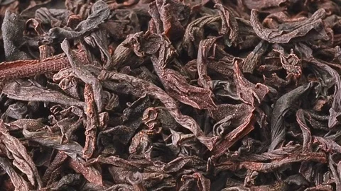 A lot of dried tea leaves, close shot. Dolly shot of pile of tea leaves Stock Footage 126742579