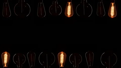 A lot of Edison bulbs creating great background for logo or title. Blinking Stock Footage 135325437